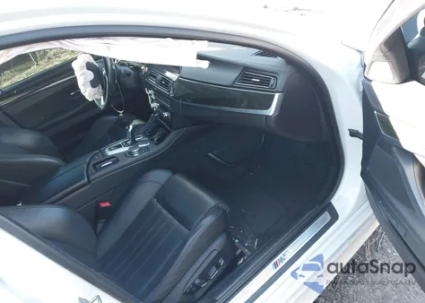 2016 BMW M5 z USA, uszkodzony, nr VIN WBSFV9C52GD595775